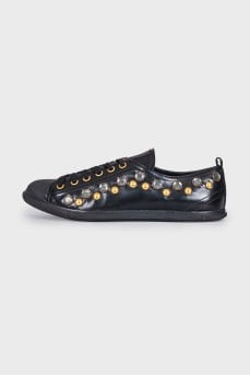 Leather sneakers with massive decor
