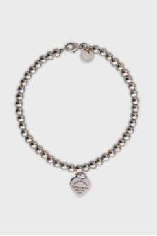 Silver bracelet with heart pendant