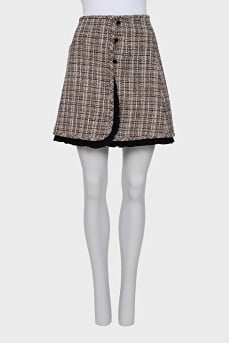 Buttoned skirt with trim