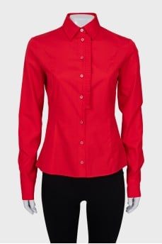 Red shirt decorated with ruffles