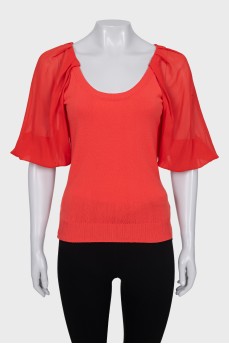 Red jumper with silk sleeves