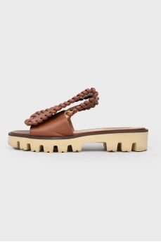 Leather slippers with eyelets