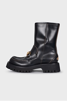 Leather boots with branded decor