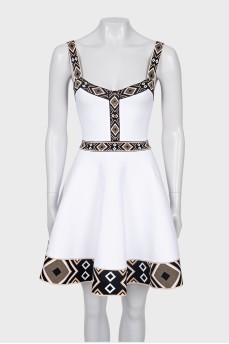 White dress with geometric pattern