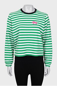 Long sleeve striped shirt decorated with a patch