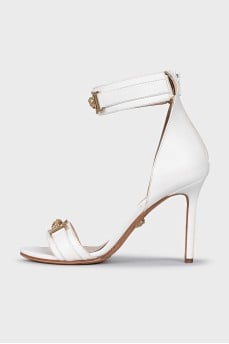 White sandals with gold decor