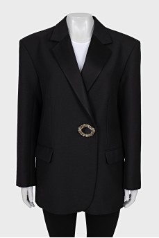 Black jacket with decorated clasp