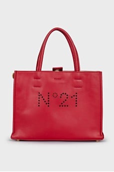 Red leather bag with brand logo