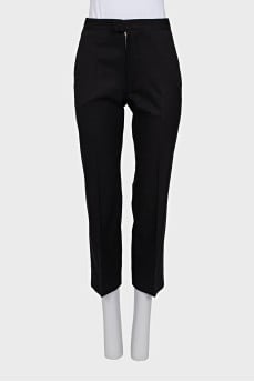 Black trousers with arrows and tag