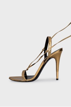 Leather lace-up sandals with tassels