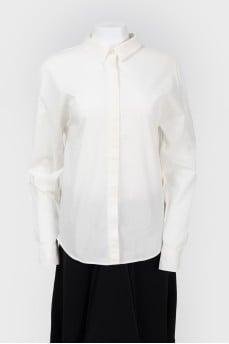 Shirt with a black bow at the back