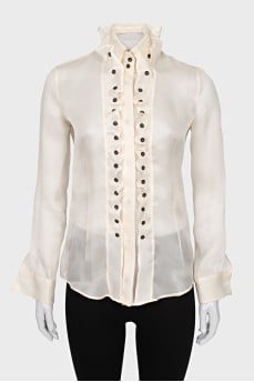 Silk blouse with buttons decorated with frills