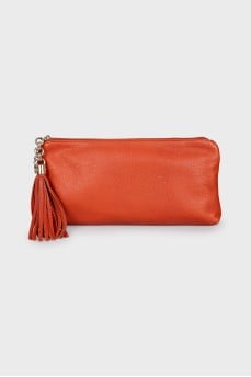 Orange leather clutch