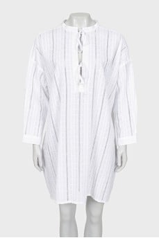 Dress with ties and perforations