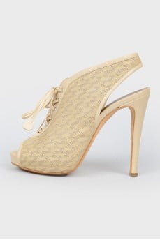Perforated stiletto sandals