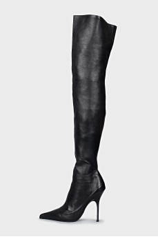 Over the knee boots with a figured heel