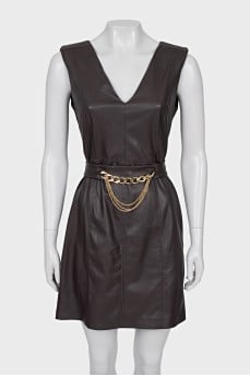 Fitted dress decorated with chains