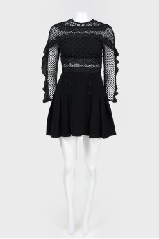 Dress with mesh inserts with tag