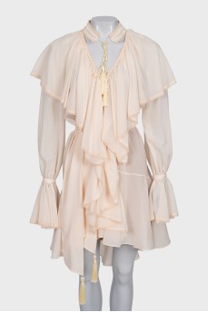 Dress with ruffles and tassels