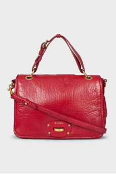 Leather bag with gold clasp