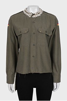 Asymmetrical shirt decorated with crystals