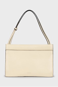 Yellow leather bag with tag