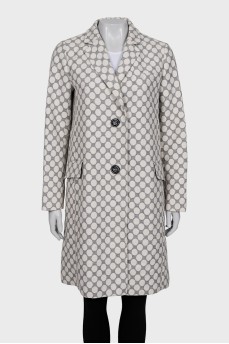 Straight-cut coat with a polka dot print