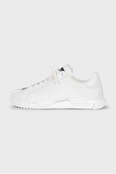White sneakers with a silver logo
