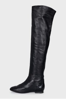 Black boots with embossed toe cap