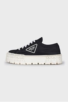 High-top sneakers with a logo