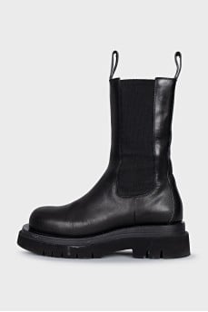 Leather boots with rough soles