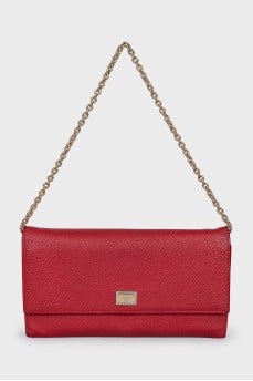 Red bag with a gold chain