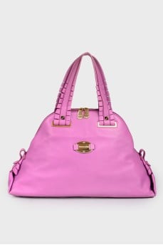 Bag with golden fittings