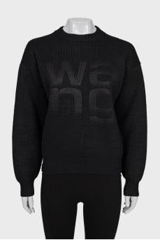 Knitted sweater with embossed logo