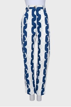 Striped jeans with signature monogram