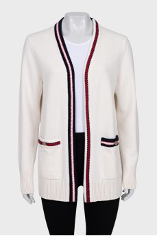 Cashmere cardigan with buttoned pockets