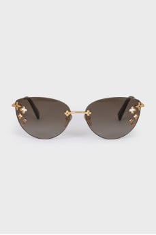 Sunglasses with decorative perforations