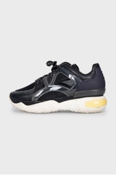 Leather and textile sneakers with a high sole