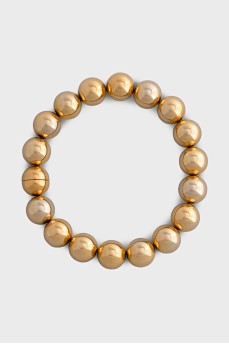 Gold necklace made of large beads
