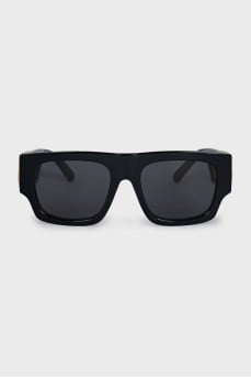 Black sunglasses with gold logo