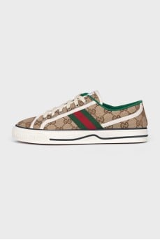 Brown sneakers with a signature print