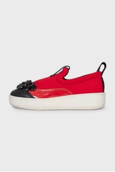 Red slip-ons with crystals