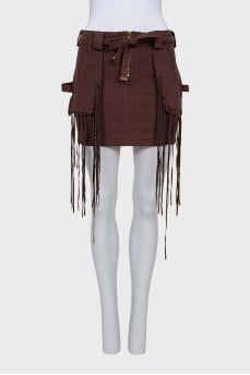 Denim skirt decorated with fringe