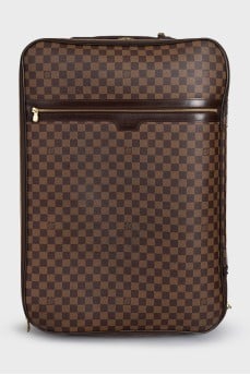 Brown suitcase with signature print