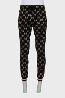 Men's sweatpants with a signature print