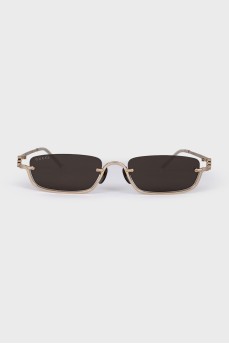 Sunglasses with gold frame and logo