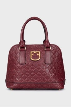 Leather bag with embossed logo