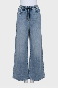 Wide-leg jeans with elastic waistband and tag