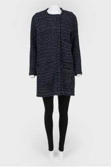 Knitted coat with patch pockets with tag