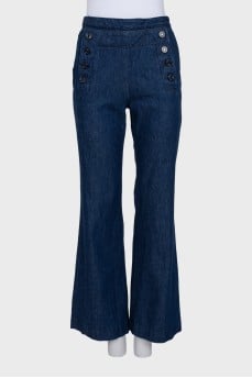 Blue straight jeans decorated with buttons